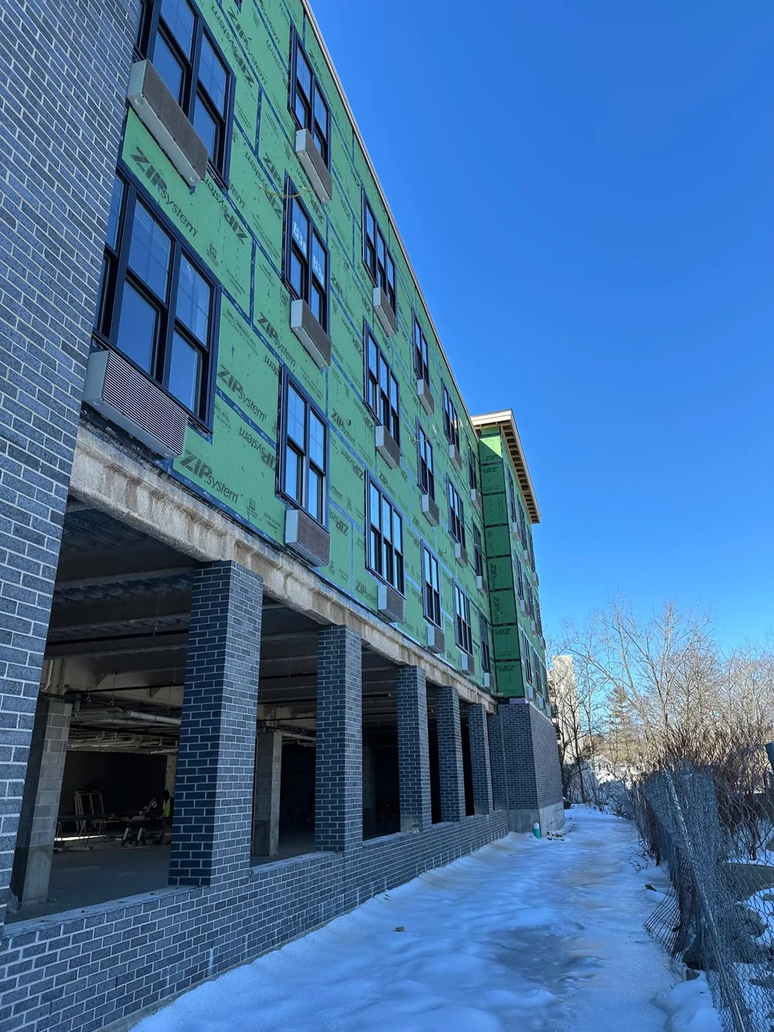 Window wall on a multifamily building, from the National Lumber project archive